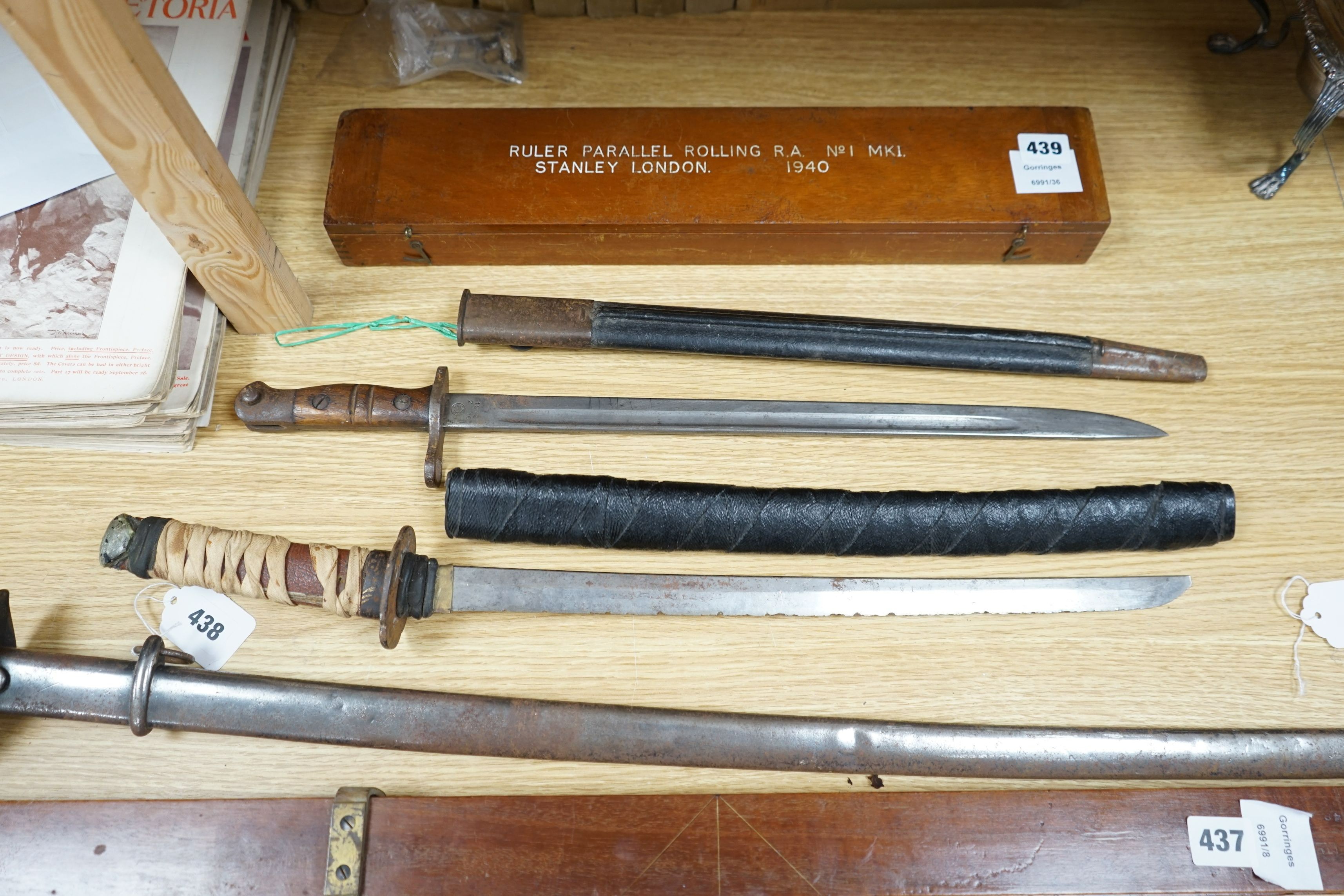 A Japanese wakizashi, a WWI bayonet and a Continental sword, sword 94cms long